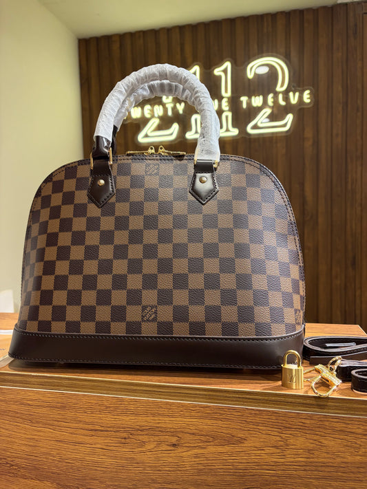 L V Alma PM Handbag 32
